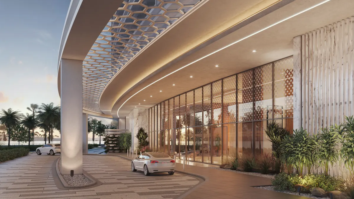 The arrival court at The Arc, a sculpted soffit over the entrance