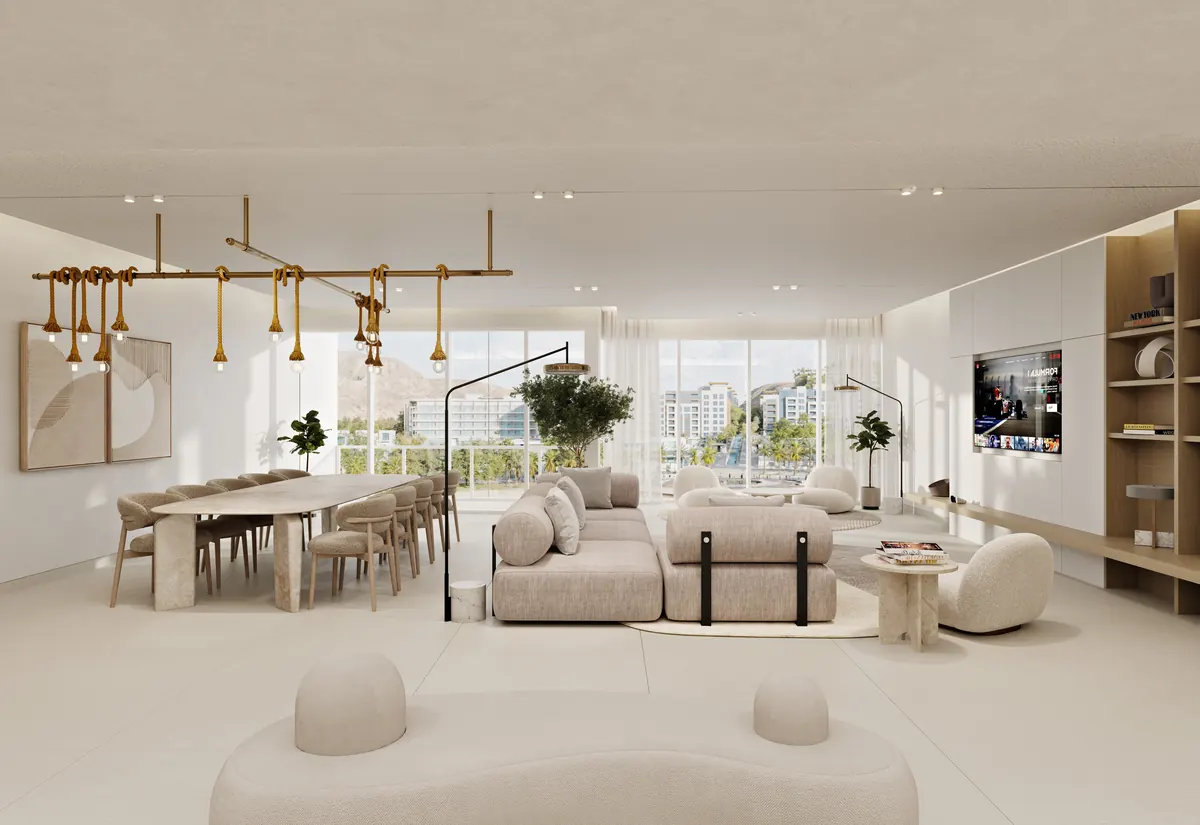 Onda Signature four bedroom living and dining in a warm coastal palette beneath a sculptural brass pendant