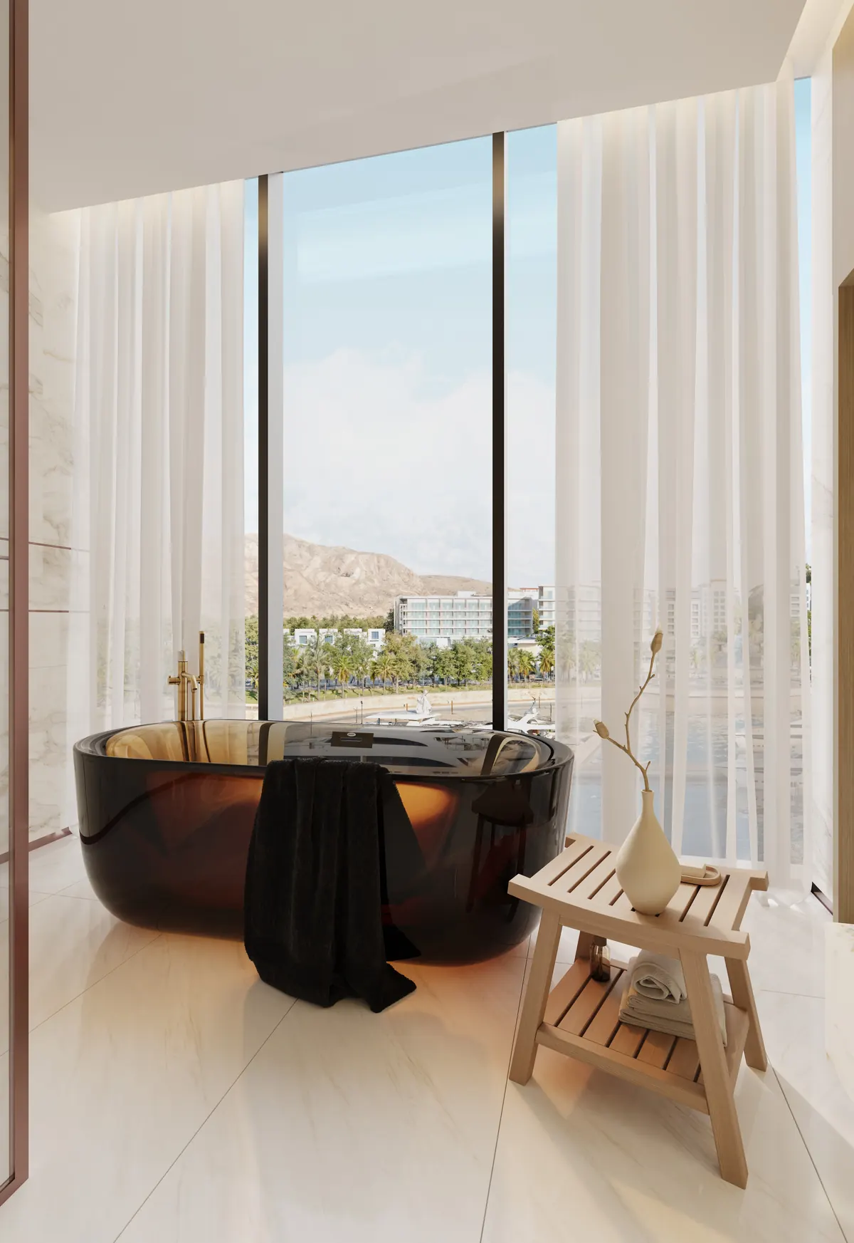 Penthouse bathroom with a freestanding bronze bath against full height glazing