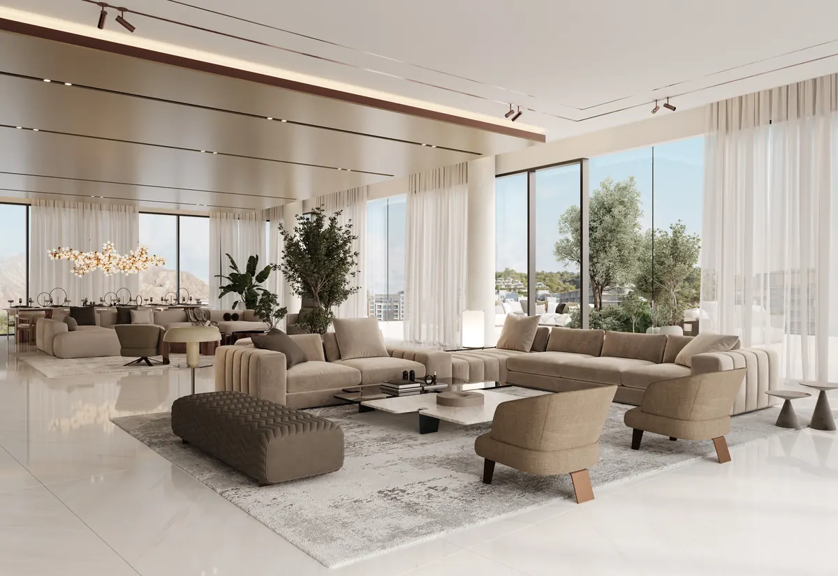Penthouse living room opening onto the terrace with mountains beyond